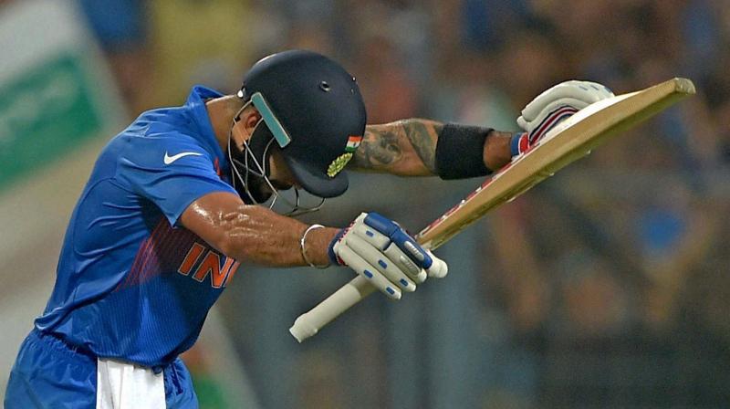 Virat Kohli bows down to Sachin Tendulkar